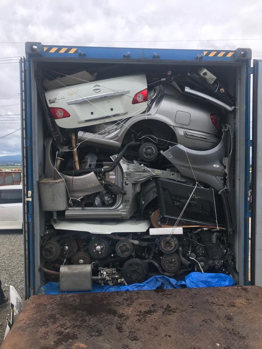40ft container fully packed — engines, panels & half-cuts